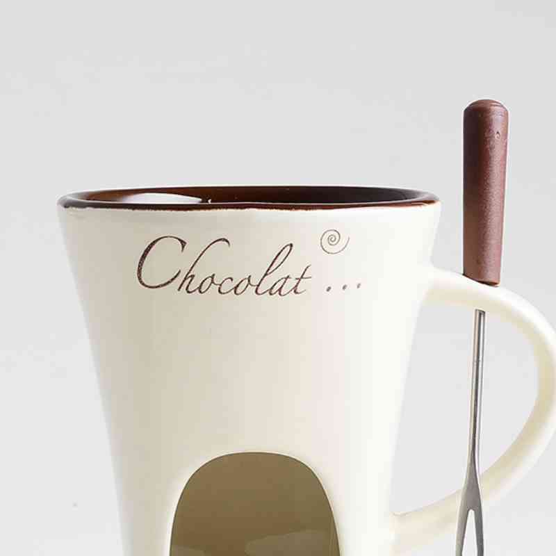 Cream-colored Fondue Mug Set – Personal Mini Chocolate Fondue Pot with brown interior and fork, perfect for home chocolate treats.
