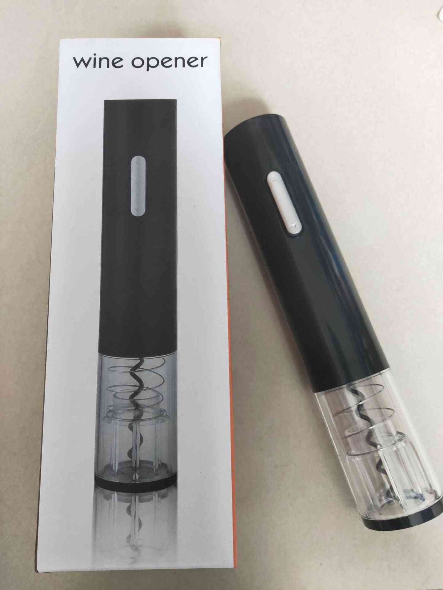 Black electric wine opener with automatic corkscrew shown next to its box. Smart kitchen tool for effortless wine bottle opening.