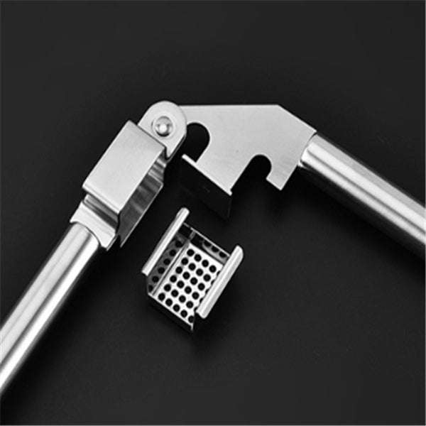 Manual garlic cutter for slicing and crushing garlic cloves