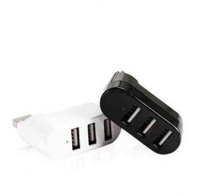 USB Hub Splitter – Multi-interface USB splitter in black and white plugged into a laptop for fast connectivity and efficient port expansion.
