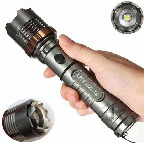 CREE T6 glare flashlight with zoom lens and rugged design, ideal for camping, emergencies, and outdoor use