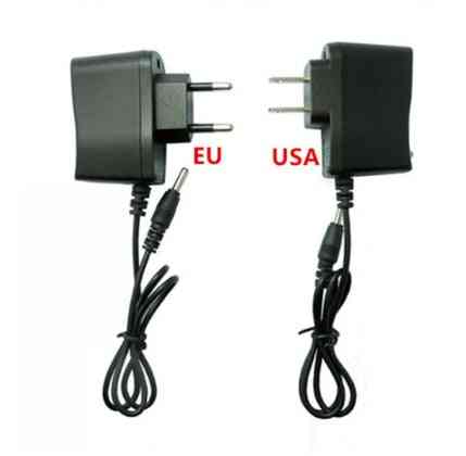 EU and USA plug adapters for CREE T6 zoom rechargeable flashlight, compatible with international charging standards