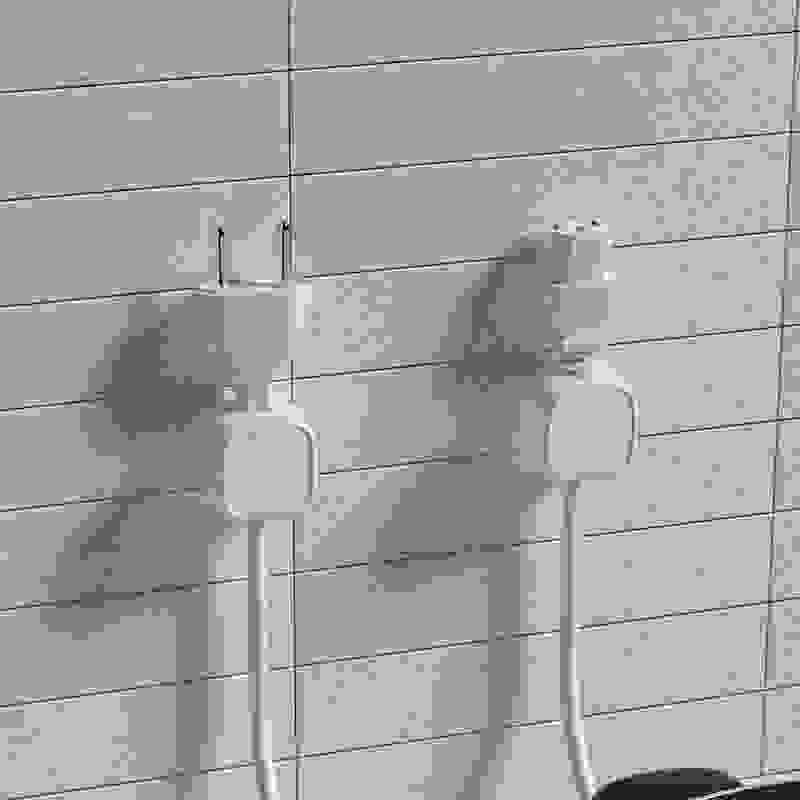 Magnetic Cable Clip – Under Desk Cable Management Organizer shown holding USB, Lightning, and Type-C cables securely in sleek black holders.