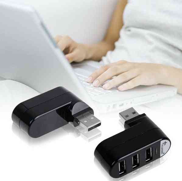 USB Hub Splitter – Multi-interface USB splitter in black and white plugged into a laptop for fast connectivity and efficient port expansion.