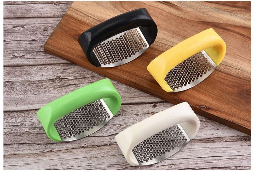Stainless steel garlic press for home cooking