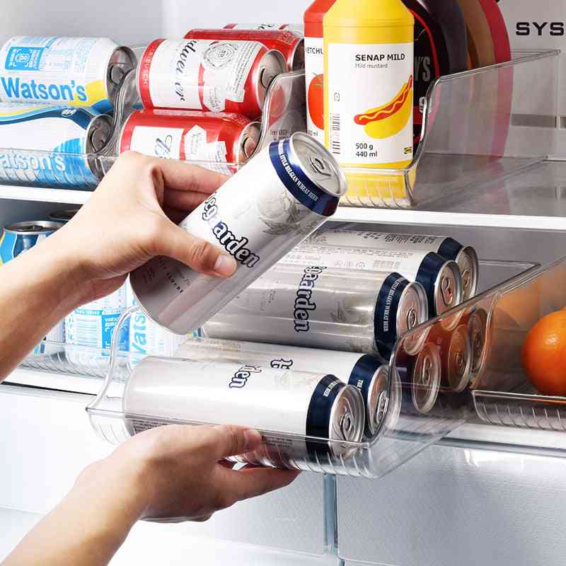 Smart kitchen essential clear fridge drink holder used to organize various beverage cans and condiments efficiently in a refrigerator.