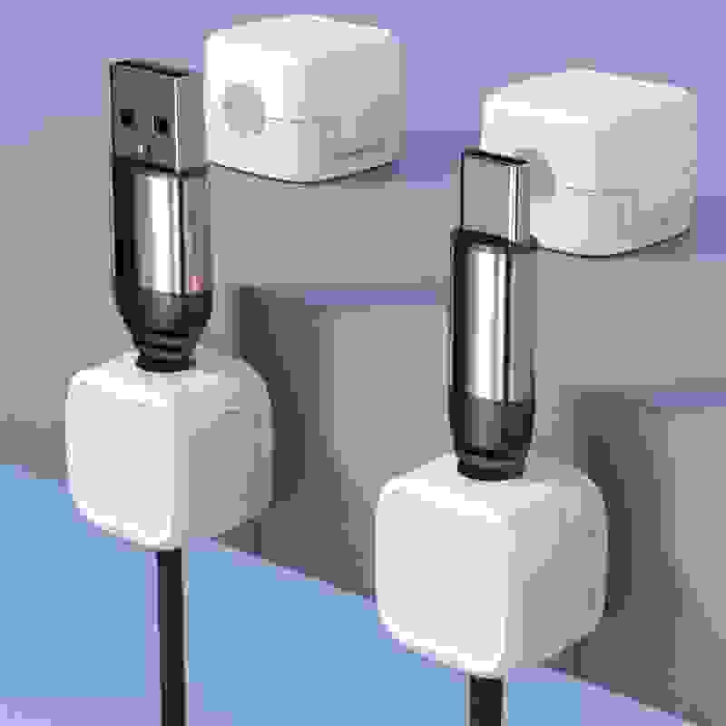 Magnetic Cable Clip – Under Desk Cable Management Organizer shown holding USB, Lightning, and Type-C cables securely in sleek black holders.