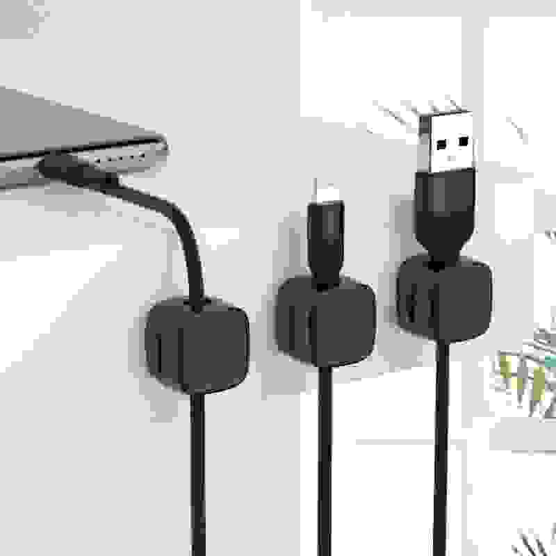 Magnetic Cable Clip – Under Desk Cable Management Organizer shown holding USB, Lightning, and Type-C cables securely in sleek black holders.