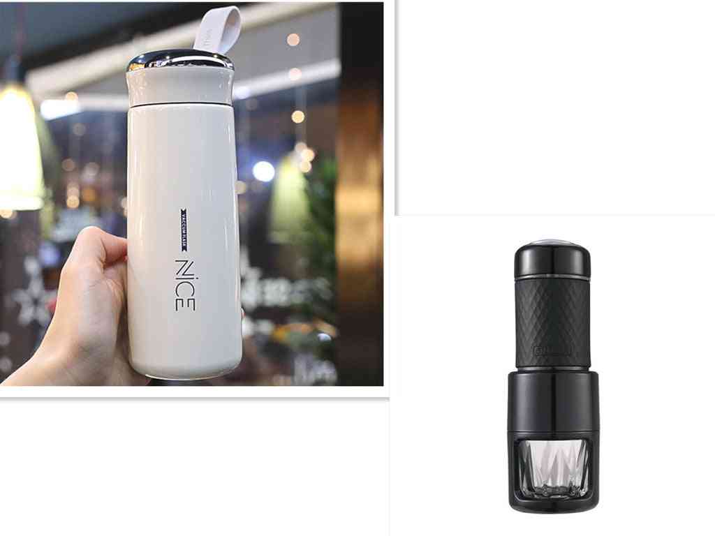 White insulated travel mug held in hand beside a black manual espresso coffee machine. Perfect combo for coffee lovers on-the-go.